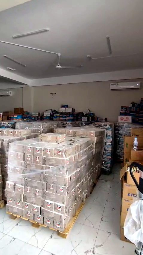 Rows of wrapped pallets on the warehouse floor