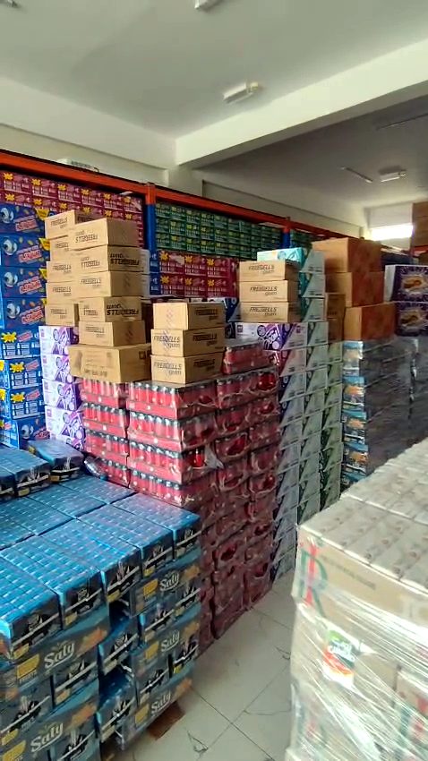 Stacks of drink cartons ready for delivery